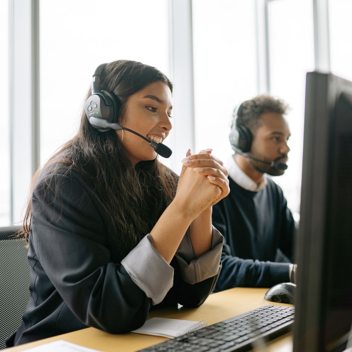 Customer support specialist assisting with a product inquiry by phone